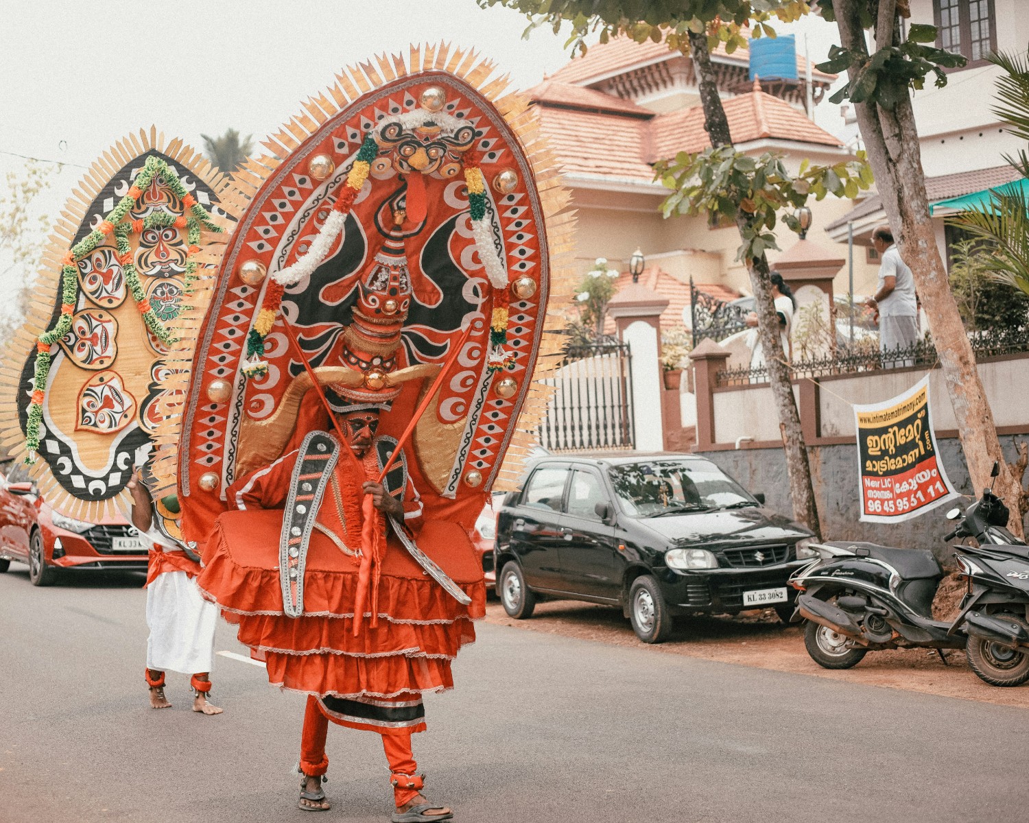 Kathakali performer in elaborate makeup and costume