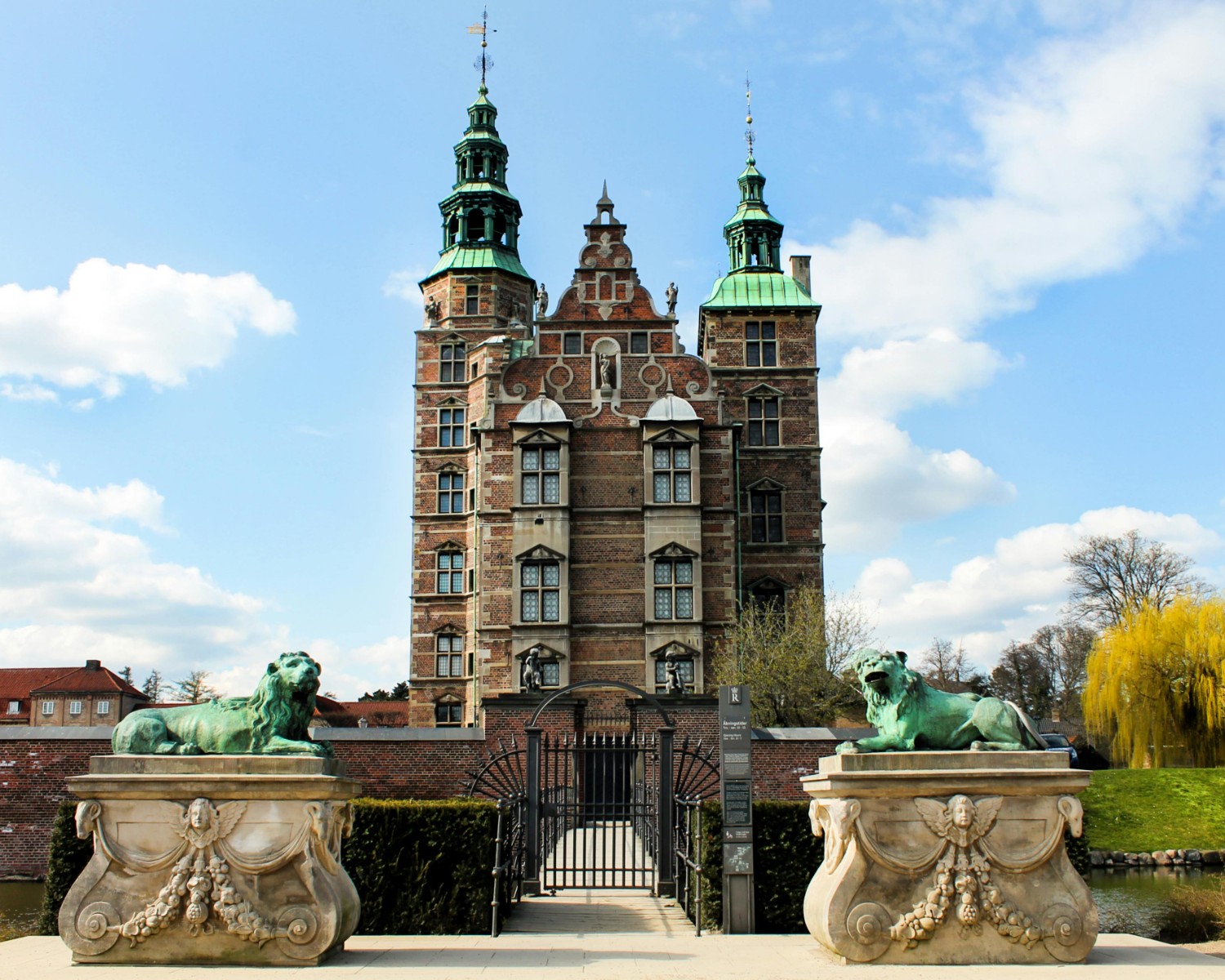 Frederiksborg Castle reflected in surrounding moat