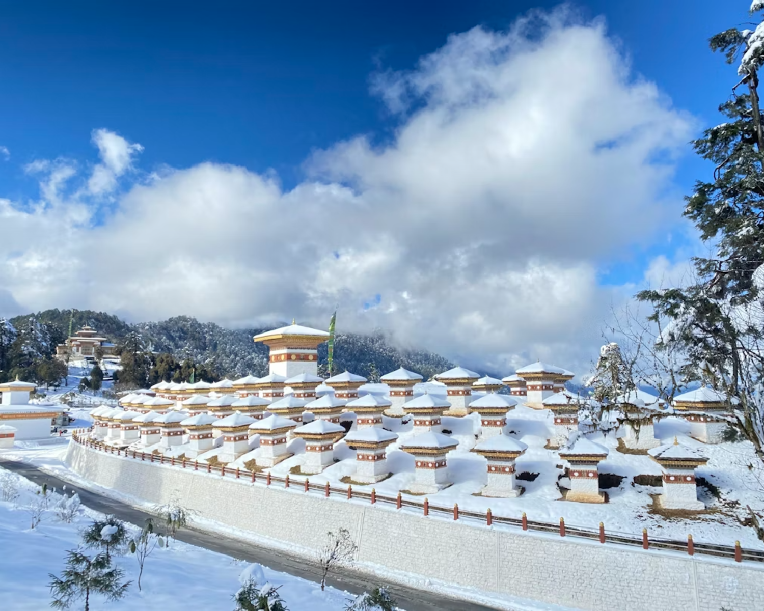 108 chortens at Dochula Pass with prayer flags