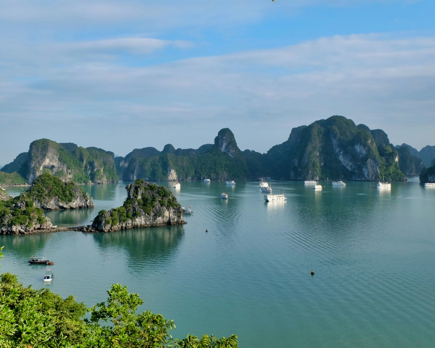 Halong Bay's iconic limestone karsts rising from emerald waters