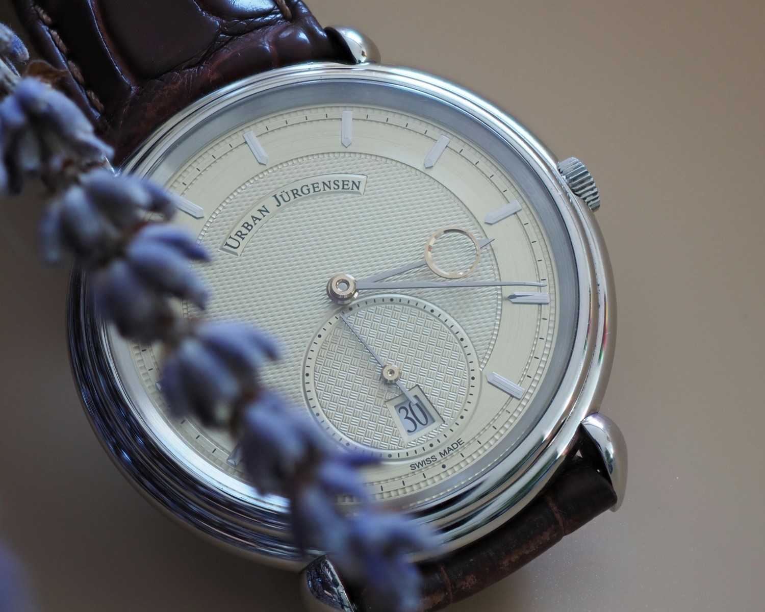 Luxury Swiss watches from Rolex, Patek Philippe, Omega showcasing precision artistry